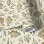 Watercolor fish wallpaper with grey-blue fish, seafoam seaweed, starfish and bubbles on warm cream
