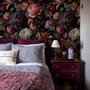 Vintage peony wallpaper mural with plum, blush and ivory flowers, dark foliage and small hummingbirds
