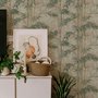 Vintage bamboo wallpaper with sage and smoky blue-green leaves on a warm taupe ground