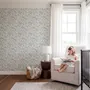 Cute cats wallpaper with dusty blue toile kittens, roses and garden scenes on warm cream