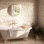 Spring floral wallpaper with pastel watercolour flowers and sage leaves on a clean white ground