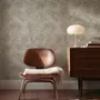 Abstract taupe and greige wallpaper with creamy white oval brush marks in flowing currents