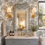 Monochrome wallpaper with grey tree toile on a clean white ground
