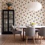 Bar area wallpaper with hand drawn cocktails, liquor bottles, citrus and fruit bowls on warm cream