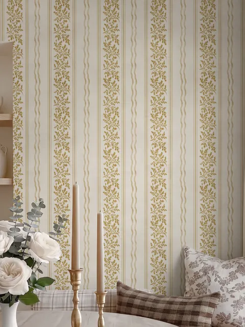 Gold and white wallpaper with antique gold leafy sprig stripes on parchment cream