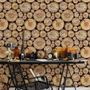 Papier peint souches de bois empilées