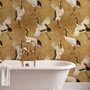 Japanese crane wallpaper with white, black and red cranes in flight on an antique-gold textured ground
