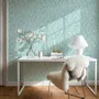 Aqua fern wallpaper with overlapping icy blue palm fronds on a pale aqua ground