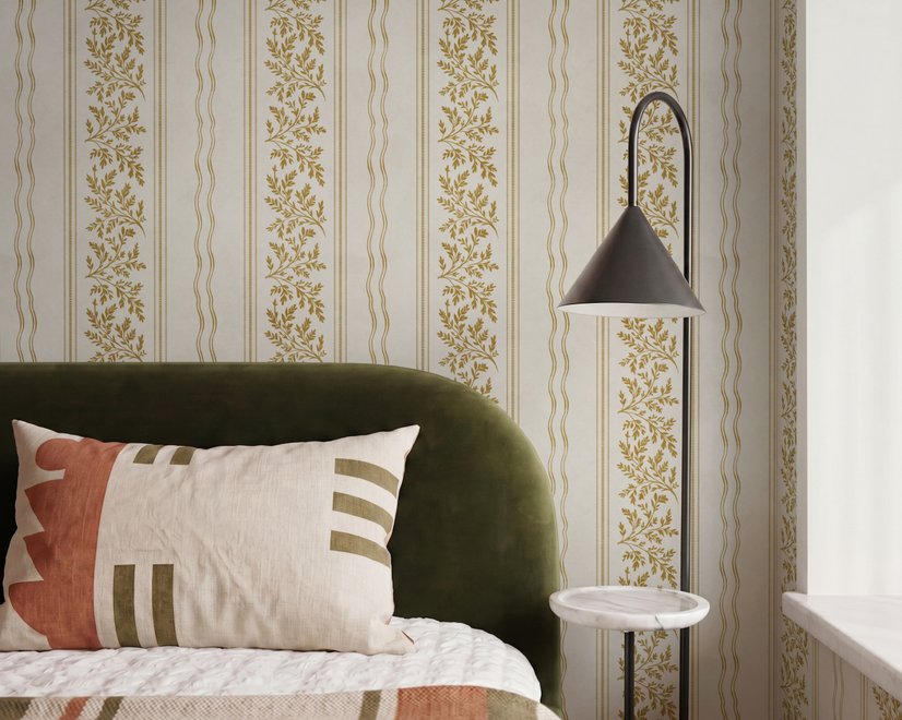 Gold and white wallpaper with antique gold leafy sprig stripes on parchment cream