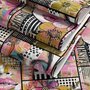 Bold wallpaper for powder room with pop art female faces, pink flowers, black comic panels, mustard, teal and fuchsia details
