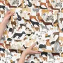Zoomie kids wallpaper with painted dog breeds in tan, brown, black and grey on white