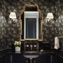Black wallpaper with antique metallic gold ginkgo leaves on a mottled charcoal ground