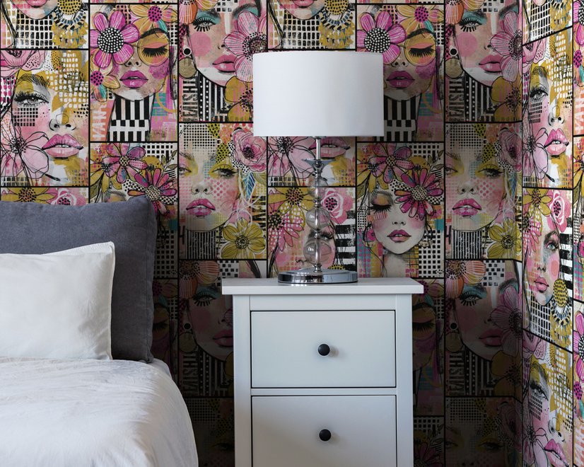 Bold wallpaper for powder room with pop art female faces, pink flowers, black comic panels, mustard, teal and fuchsia details
