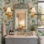 Chinoiserie wallpaper with peach birds, orchids and peonies on a pale duck egg blue ground