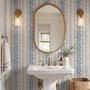 Blue wallpaper with indigo botanical stripework, pinstripes and dotted borders on warm cream parchment
