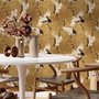 Japanese crane wallpaper with white, black and red cranes in flight on an antique-gold textured ground
