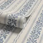 Blue wallpaper with indigo botanical stripework, pinstripes and dotted borders on warm cream parchment