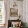 Blue and light blue wallpaper with hand-painted vertical watercolour stripes on a clean white ground