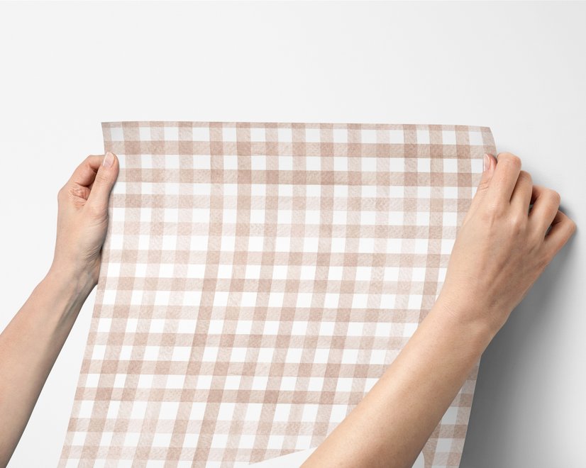 Soft brown wallpaper with pale beige gingham checks on a warm cream off-white ground