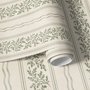 Green aesthetic wallpaper with sage leafy sprigs, fine vertical rules and dotted borders on cream ivory