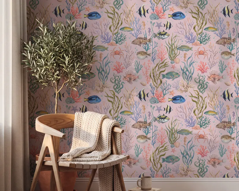 Cute pink seashell wallpaper with watercolour reef fish, coral, seaweed, starfish and shells on blush pink