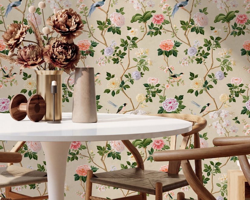 Chinoiserie wallpaper with blue-grey birds, pink peonies, white orchids and green branches on ivory-cream ground