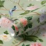 Celadon-sage chinoiserie wallpaper with blue-grey birds, tan branches, pink peonies and white orchids
