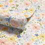 Spring floral wallpaper with pastel watercolour flowers and sage leaves on a clean white ground