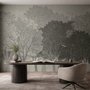 Light gray wallpaper mural with layered ink-wash woodland trees, falling leaves and birds