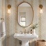 Gold and white wallpaper with antique gold leafy sprig stripes on parchment cream