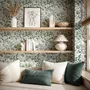 Sage green botanical floral wallpaper with white poppy flowers, lobed leaves and dotted seed centres