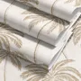 Muted sandy taupe palm trees and pale foliage on a creamy ivory ground tropical wallpaper