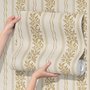 Gold and white wallpaper with antique gold leafy sprig stripes on parchment cream