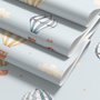Hot air balloon wallpaper with watercolor balloons, ivory clouds and peach gold stars on pale powder blue