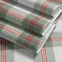 Sage green and cream-white tartan plaid wallpaper with deep red stripes and woven thread texture