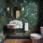 Floral wallpaper with birds in a teal chinoiserie garden with blossoms, pheasant, palms and stone railings
