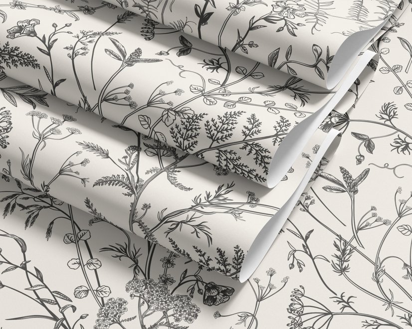 Black outline botanical wallpaper with charcoal wildflowers and grasses on a warm ivory cream ground