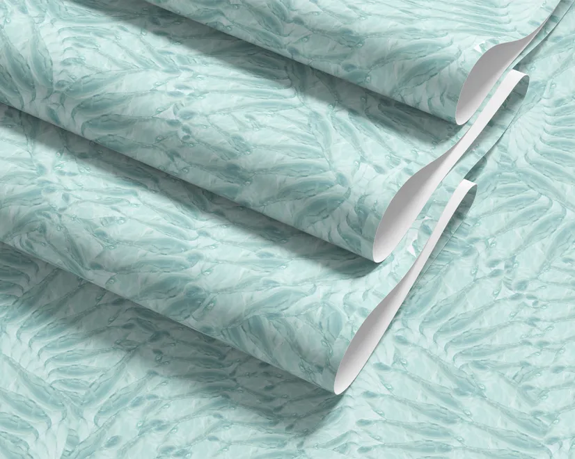Aqua fern wallpaper with overlapping icy blue palm fronds on a pale aqua ground