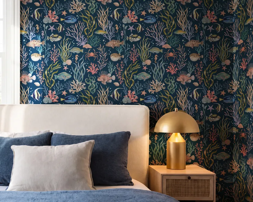 Aquarium fish tank wallpaper repeat with tropical fish, coral, seaweed, shells and bubbles on deep navy blue