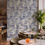 Jungle wallpaper with animals in navy toile, showing tigers, elephants and monkeys on an ivory cream ground
