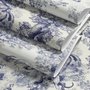 Jungle wallpaper with animals in navy toile, showing tigers, elephants and monkeys on an ivory cream ground