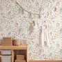 Watercolour wildflower wallpaper with pastel flowers and sage leaves on a white ground