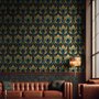 Art Deco feathers wallpaper with turquoise peacock eyes, gold plumes and navy teal ground