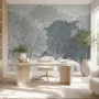 Light gray wallpaper mural with misty forest trees, falling leaves and birds