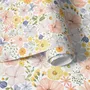 Spring floral wallpaper with pastel watercolour flowers and sage leaves on a clean white ground