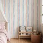 Blue and light blue wallpaper with hand-painted vertical watercolour stripes on a clean white ground