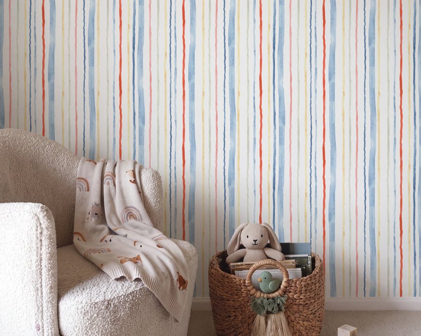 Blue and light blue wallpaper with hand-painted vertical watercolour stripes on a clean white ground