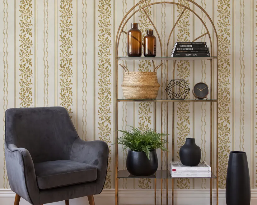 Gold and white wallpaper with antique gold leafy sprig stripes on parchment cream