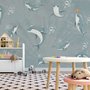 Papier peint panoramique pour la chambre d'enfant du dauphin en train de jouer
