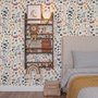 Watercolour floral wallpaper repeat with navy, blue, blush and peach wildflowers on warm cream
